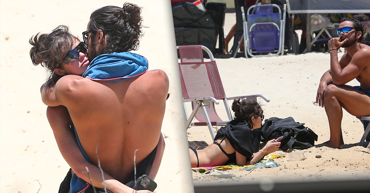 Agatha Moreira e Rodrigo Simas trocam beijos e abraços em dia de praia no Rio