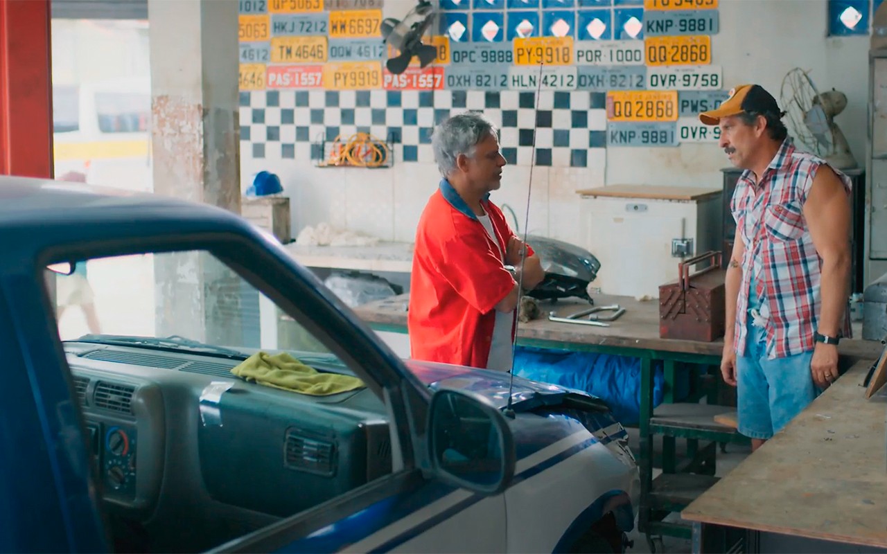Imagem de uma tela de computador com foto do proprietário do carro