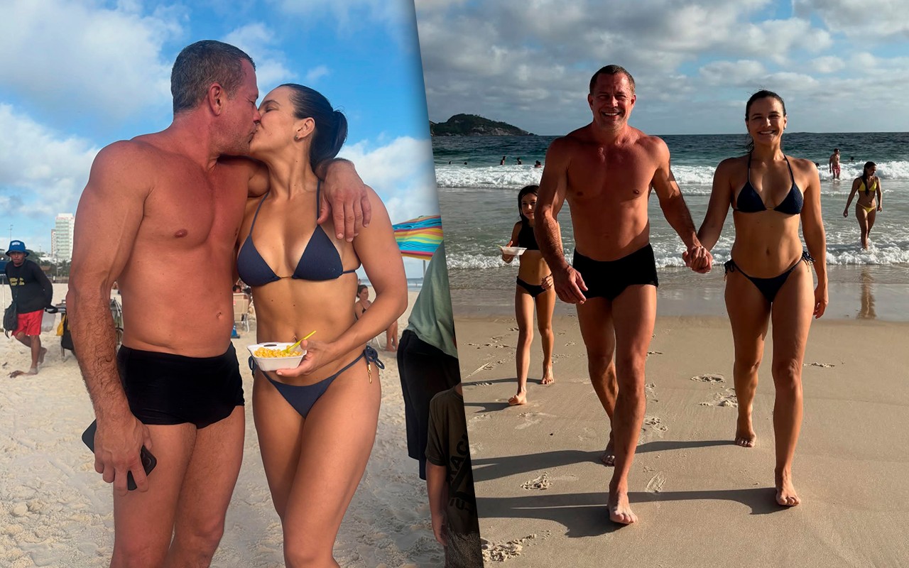 Malvino Salvador e Kyra Gracie se beijam na praia durante o Carnaval