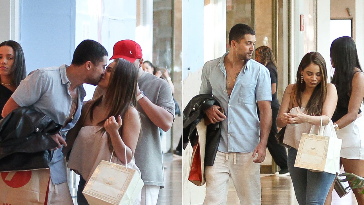 Lexa e Ricardo Vianna posam sorridentes no elevador após treino