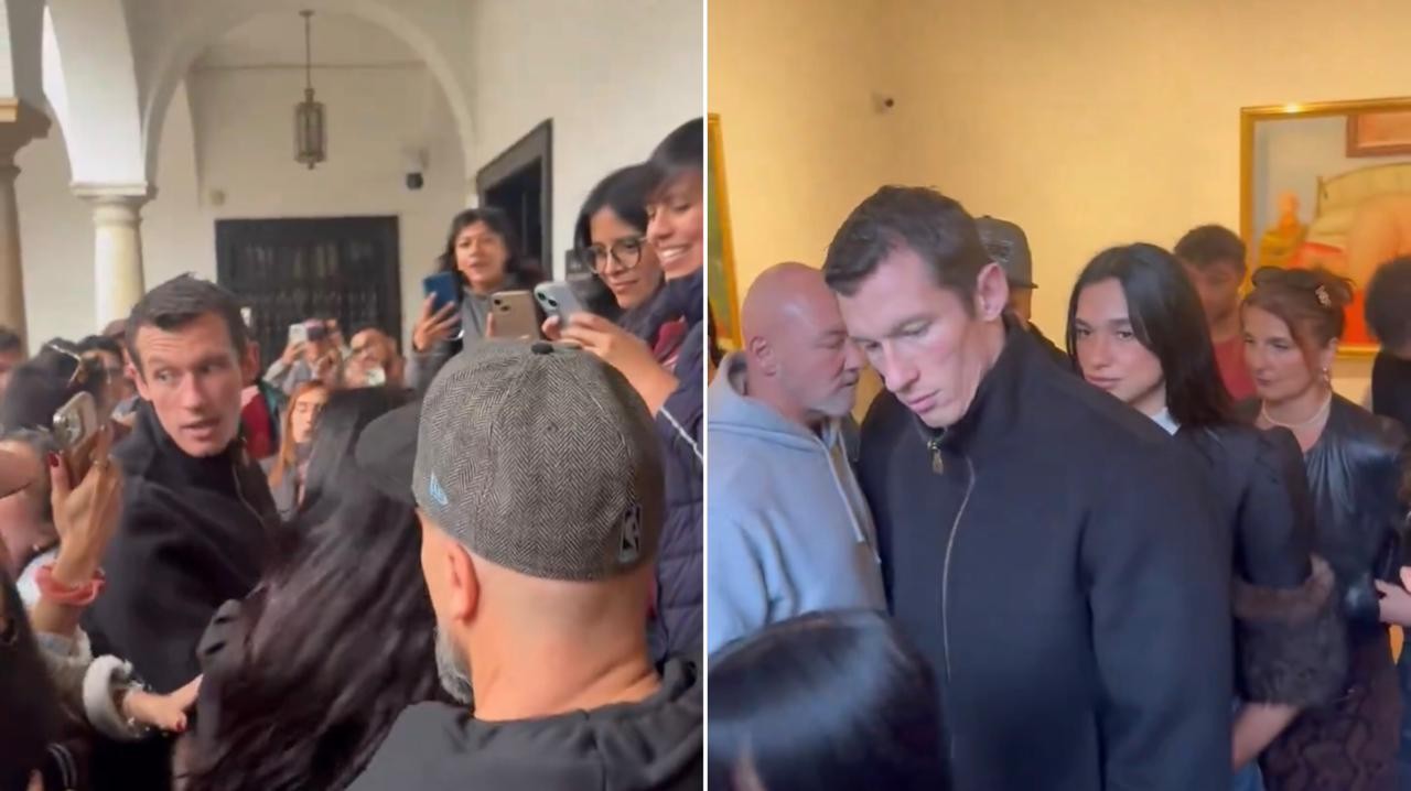 Noivo de Dua Lipa, Callum Turner fecha a cara e se incomoda com assédio de fãs da cantora na Colômbia