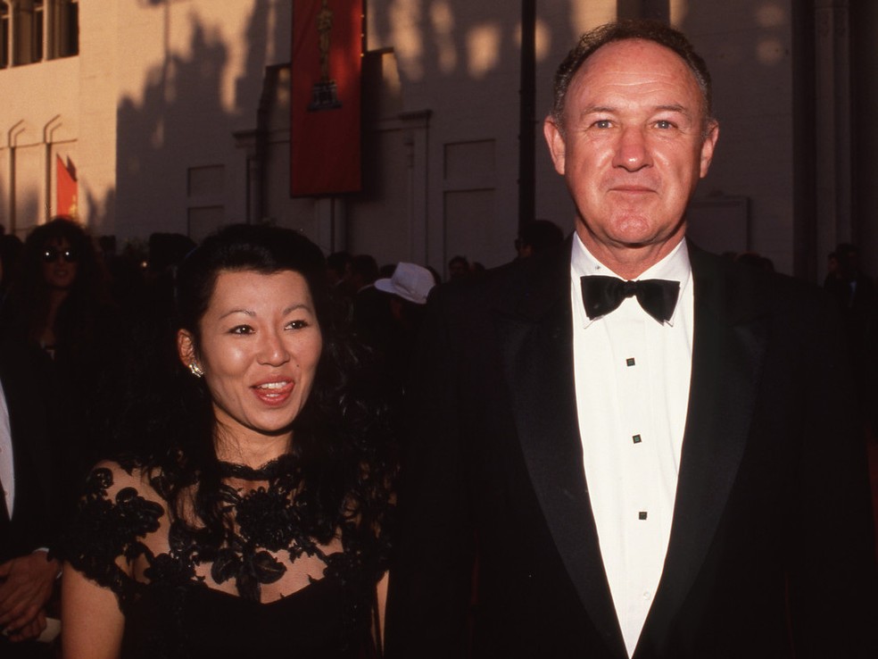 Gene Hackman e sua esposa Betsy Arakawa juntos na cerim&ocirc;nia do Oscar de 1989 &mdash; Foto: Reuters